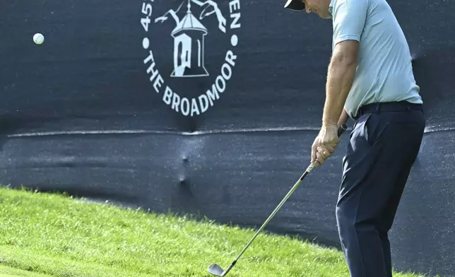 Padraig Harrington hits onto the green on the 10th hole on the first day at the U.S. Senior Open Championship at Broadmoor Golf Club in Colorado Springs, Colo., Thursday, June 26, 2025. (Jerilee Bennett/The Gazette via AP)