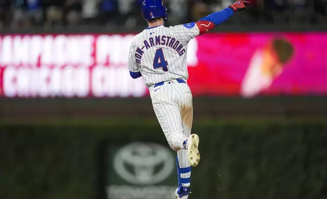 Chicago Cubs' Pete Crow-Armstrong (4) runs the bases after hitting a home run during the eighth inning of a baseball game against the Milwaukee Brewers, Tuesday, June 17, 2025, in Chicago. (AP Photo/Erin Hooley)