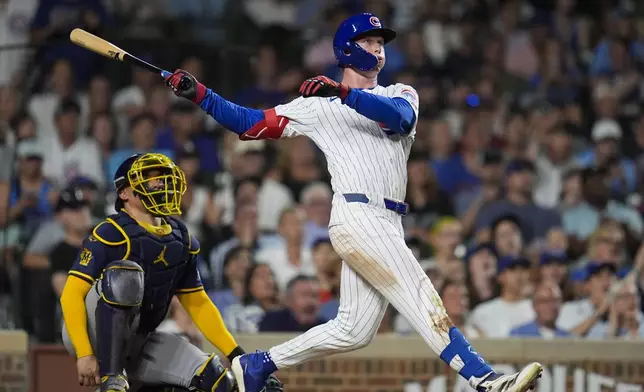 Chicago Cubs' Pete Crow-Armstrong (4) hits a home run during the eighth inning of a baseball game against the Milwaukee Brewers, Tuesday, June 17, 2025, in Chicago. (AP Photo/Erin Hooley)