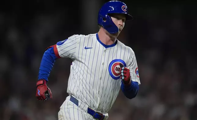Chicago Cubs' Pete Crow-Armstrong (4) runs the bases after hitting a home run during the eighth inning of a baseball game against the Milwaukee Brewers, Tuesday, June 17, 2025, in Chicago. (AP Photo/Erin Hooley)
