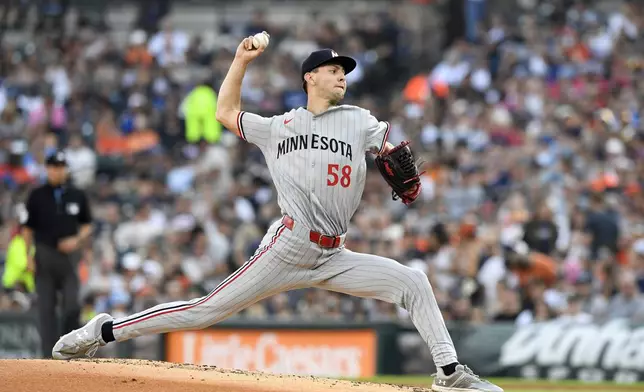 Minnesota Twins starting pitcher David Festa throws during the first inning of a baseball game against the Detroit Tigers, Friday, June 27, 2025, in Detroit. (AP Photo/Jose Juarez)