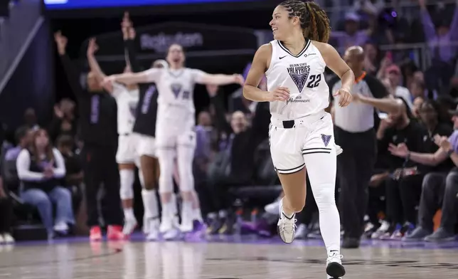 Golden State Valkyries' Veronica Burton smiles after a 3-pointer during the second quarter of a WNBA basketball game against the against Connecticut Sun, Sunday, June 22, 2025, in San Francisco. (Scott Strazzante/San Francisco Chronicle via AP)
