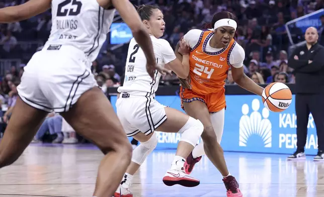 Golden State Valkyries' Kaitlyn Chen defends Connecticut Sun's Aneesah Morrow in 2nd quarter during WNBA game at Chase Center in San Francisco on Sunday, June 22, 2025. (Scott Strazzante/San Francisco Chronicle via AP)