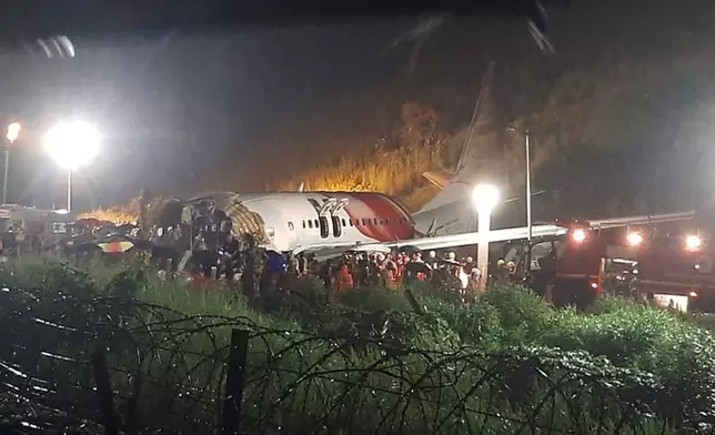 FILE - The Air India Express flight that skidded off a runway while landing at the airport in Kozhikode, Kerala state, India, Friday, Aug. 7, 2020. (AP Photo, File)