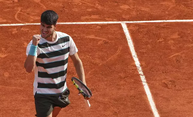 Spain's Carlos Alcaraz reacts during the final match of the French Tennis Open against Italy's Jannik Sinner at the Roland-Garros stadium in Paris, Sunday, June 8, 2025. (AP Photo/Lindsey Wasson)