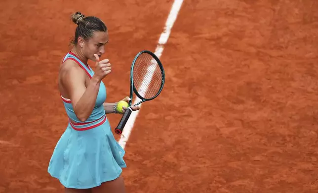 Aryna Sabalenka of Belarus reacts while playing Coco Gauff of the U.S. during the final match of the French Tennis Open at the Roland-Garros stadium in Paris, Saturday, June 7, 2025. (AP Photo/Lindsey Wasson)