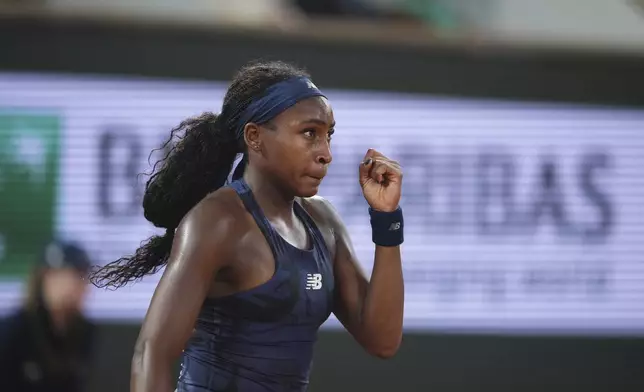 Coco Gauff of the U.S. reacts as she plays against France's Lois Boisson during their semifinal match of the French Tennis Open at the Roland-Garros stadium in Paris, Thursday, June 5, 2025. (AP Photo/Lindsey Wasson)