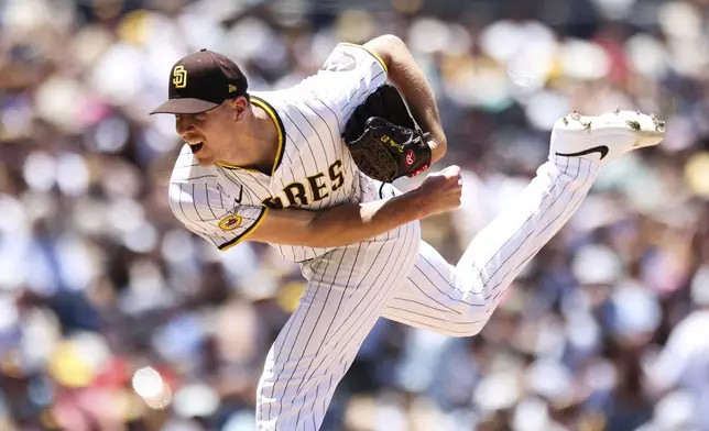 San Diego Padres' Nick Pivetta follows through on a pitch against the Washington Nationals in the second inning of a baseball game Wednesday, June 25, 2025, in San Diego. (AP Photo/Derrick Tuskan)