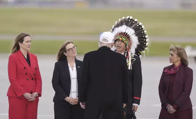 President Donald Trump arrives on Air Force One at Calgary International Airport, Sunday, June 15, 2025, in Calgary, Canada, ahead of the G7 Summit. (AP Photo/Gerald Herbert)