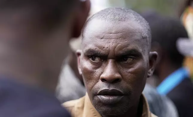 Jonah Kariuki, 50, whose son Boniface Kariuki was shot at close range by a Kenyan police officer during a protest, walks out of Kenyatta National Hospital in Nairobi, Kenya Wednesday, June 18, 2025. (AP Photo/Brian Inganga)