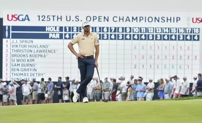 Sam Burns waits to putt on the 18th hole during the second round of the U.S. Open golf tournament at Oakmont Country Club Friday, June 13, 2025, in Oakmont, Pa. (AP Photo/Gene J. Puskar)