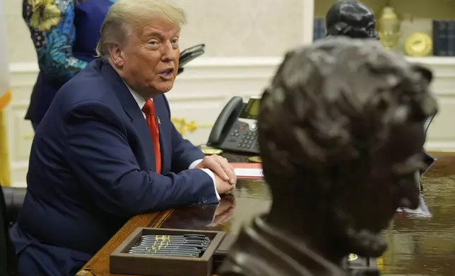 President Donald Trump answers questions from reporters as he meets with Congo's Foreign Minister Therese Kayikwamba Wagner, and Rwanda's Foreign Minister Olivier Nduhungirehe, Friday, June 27, 2025, in the Oval Office at the White House in Washington. (AP Photo/Manuel Balce Ceneta)