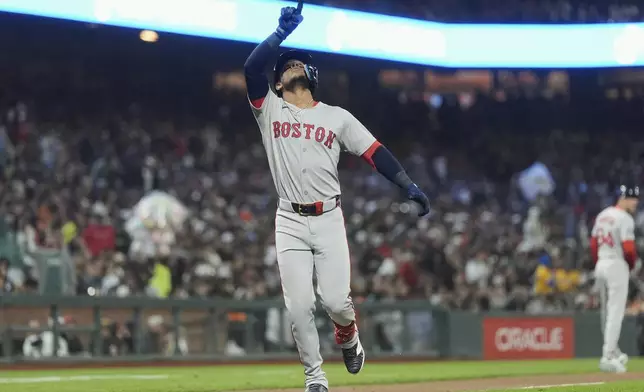 Boston Red Sox's Ceddanne Rafaela celebrates after hitting a home run against the San Francisco Giants during the sixth inning of a baseball game in San Francisco, Friday, June 20, 2025. (AP Photo/Jeff Chiu)