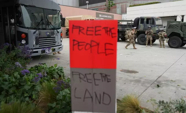 U.S. National Guard are deployed around downtown Los Angeles, Sunday, June 8, 2025, following an immigration raid protest the night before. (AP Photo/Eric Thayer)