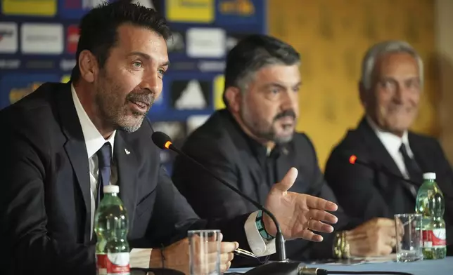 Italian former player Gianluigi Buffon, left, talks to reporters during a press conference with newly appointed Italian national soccer team head coach Rino Gattuso, center, and Italian Soccer Federation, FGCI, president Gabriel Gravina, in Rome, Thursday, June 19, 2025. (AP Photo/Alessandra Tarantino)