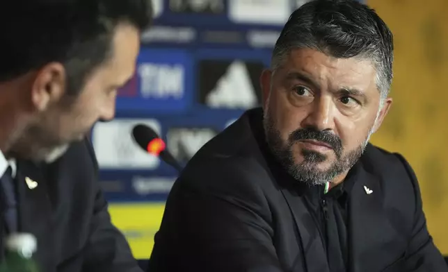 Newly appointed Italian national soccer team head coach Rino Gattuso, right, holds a press conference, in Rome, Thursday, June 19, 2025. (AP Photo/Alessandra Tarantino)