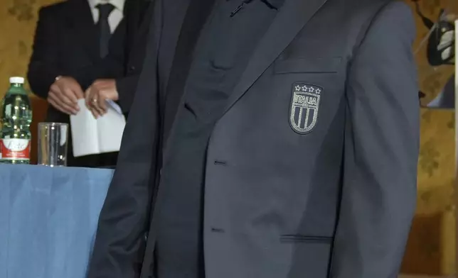 Newly appointed Italian national soccer team head coach Rino Gattuso arrives for a press conference, in Rome, Thursday, June 19, 2025. (AP Photo/Alessandra Tarantino)