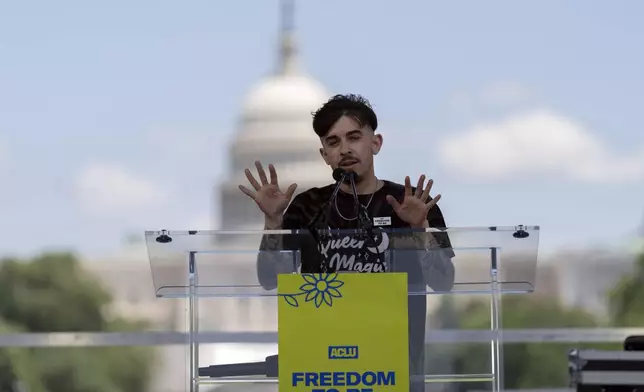 FILE - Chase Strangio, co-director of the ACLU's LGBT &amp; HIV Project, speaks during the transgender rights rally on the National Mall, Saturday, May 17, 2025, in Washington. (AP Photo/Jose Luis Magana)