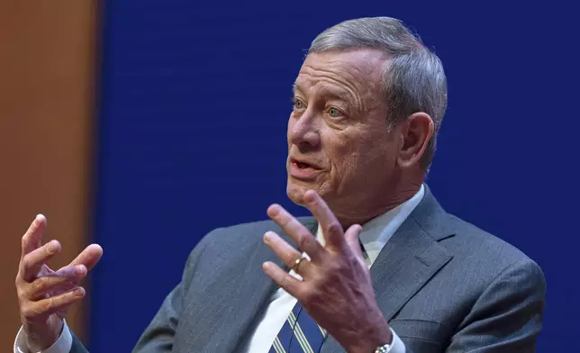 FILE - Chief Justice of the U.S. Supreme Court John Roberts speaks during a lecture to the Georgetown Law School graduating class of 2025, in Washington, May 12, 2025. (AP Photo/Manuel Balce Ceneta, File)