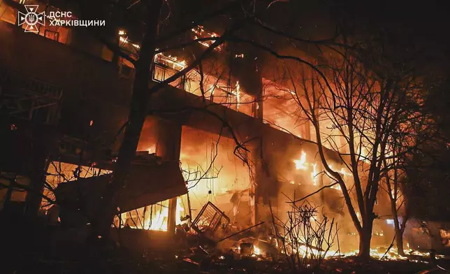 In this photo provided by the Ukrainian Emergency Service, a view after a Russian attack that hit a residential building in Kharkiv, Ukraine, Wednesday, June 11, 2025. (Ukrainian Emergency Service via AP)