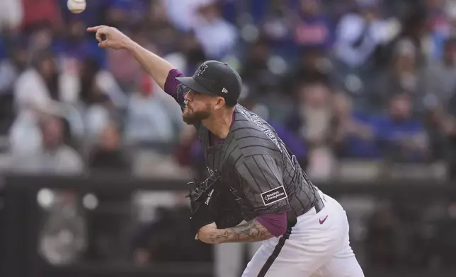 New York Mets' Chris Devenski pitches during the ninth inning of a baseball game against the Colorado Rockies Saturday, May 31, 2025, in New York. (AP Photo/Frank Franklin II)
