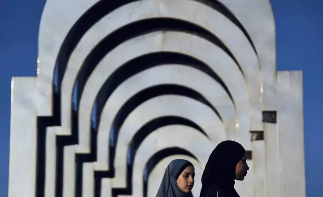Muslim worshippers gather for Eid al-Adha prayer in the mixed Arab Jewish city of Jaffa, near Tel Aviv, Israel, Friday, June 6, 2025. (AP Photo/Oded Balilty)