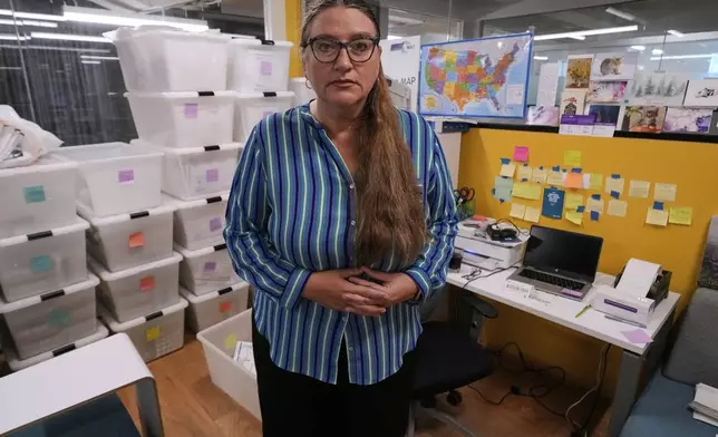 Dr. Angel Foster, co-founder of Massachusetts Medication Abortion Access Project, poses for a photo at the organization's headquarters, May 13, 2025, in Somerville, Mass. (AP Photo/Charles Krupa)