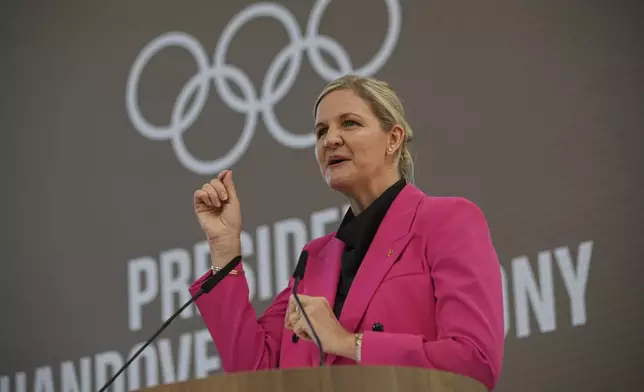 President-elect Kirsty Coventry speaks during the handover ceremony of the IOC Presidency at Olympic House in Lausanne, Switzerland, Monday, June 23, 2025. (AP Photo/Laurent Cipriani)