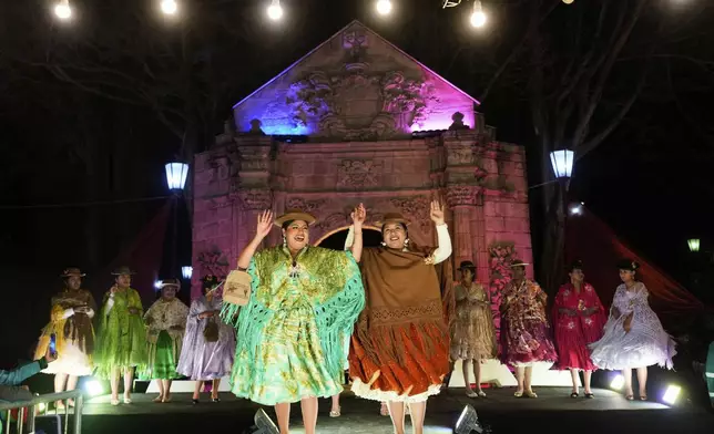 Women compete in Miss Cholita Pacena beauty pageant, an annual contest aiming to recognize Aymara Indigenous women's fashion and beauty, as well as their command of the Indigenous lifestyle and language, in La Paz, Bolivia, Friday, June 27, 2025. (AP Photo/Juan Karita)