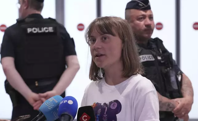 Activist Greta Thunberg arrives from Israel at Charles de Gaulle airport Tuesday, June 10, 2025, north of Paris. (AP Photo/Michel Euler)
