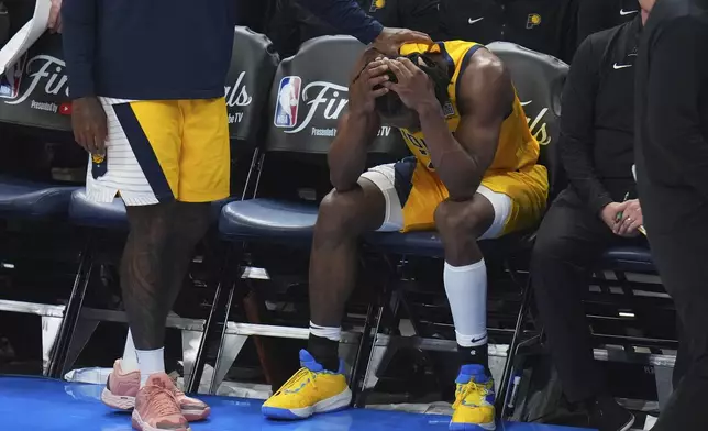 Indiana Pacers forward Aaron Nesmith (23) reacts after losing the NBA basketball championship in Game 7 against the Oklahoma City Thunder Sunday, June 22, 2025, in Oklahoma City. (AP Photo/Nate Billings)