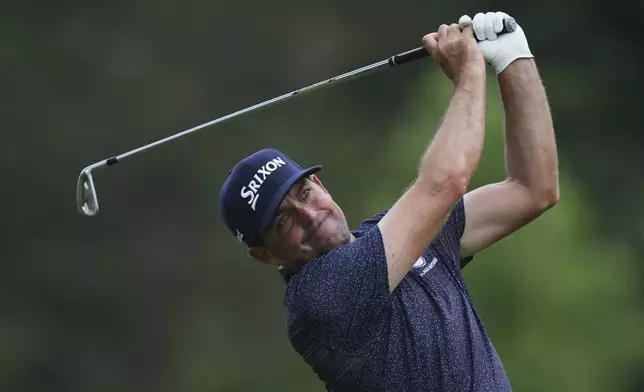 Keegan Bradley hits from the ninth tee during the first round of the Rocket Classic golf tournament at the Detroit Golf Club, Thursday, June 26, 2025, in Detroit. (AP Photo/Paul Sancya)