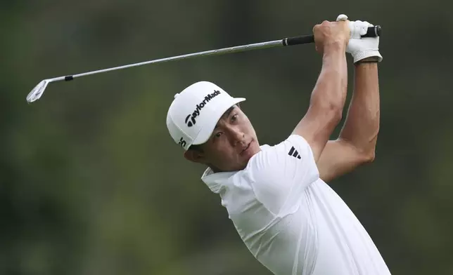 Collin Morikawa hits from the ninth tee during the first round of the Rocket Classic golf tournament at the Detroit Golf Club, Thursday, June 26, 2025, in Detroit. (AP Photo/Paul Sancya)