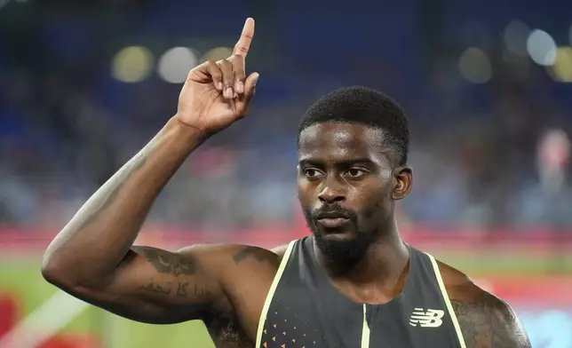 Trayvon Bromell, of the United States, celebrates after winning the men 100 meters at the Diamond League Golden Gala Pietro Mennea athletics meet at the Stadio Olimpico in Rome, Friday, June 6, 2025. (AP Photo/Gregorio Borgia)