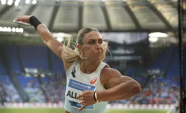 Valarie Allman, of the United States, makes an attempt in the women discus throw at the Diamond League Golden Gala Pietro Mennea athletics meet at the Stadio Olimpico in Rome, Friday, June 6, 2025. (AP Photo/Alessandra Tarantino)