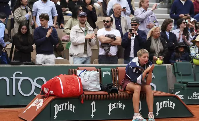 Great Britain's Hannah Klugman sits after losing the girl's singles final match of the French Tennis Open against Austria's Lilli Tagger at the Roland-Garros in Paris, Saturday, June 7, 2025. (AP Photo/Lindsey Wasson)