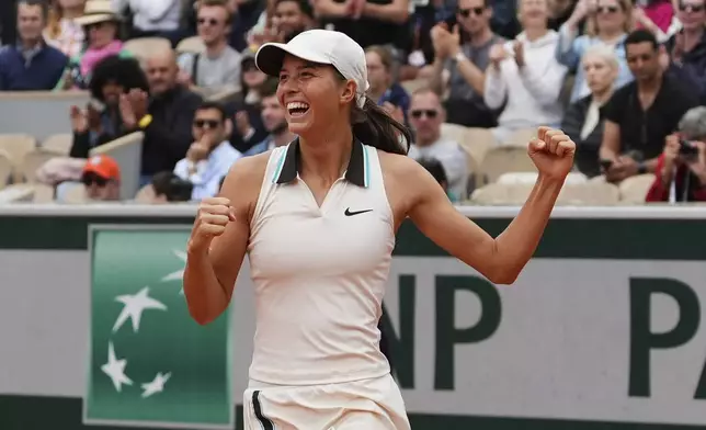 Austria's Lilli Tagger celebrates after winning the girl's singles final match of the French Tennis Open at the Roland-Garros against Great Britain's Hannah Klugman in Paris, Saturday, June 7, 2025. (AP Photo/Lindsey Wasson)