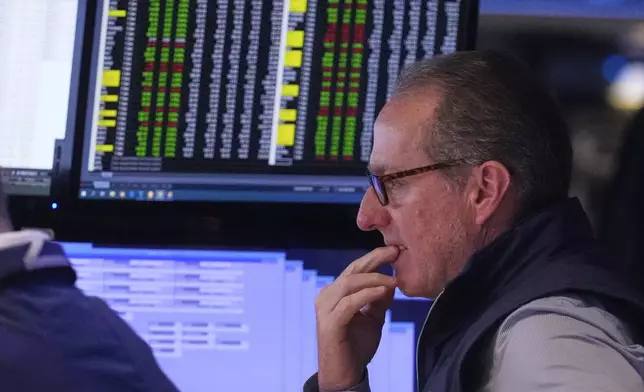 Specialist Glenn Carell works on the floor of the New York Stock Exchange, Tuesday, June 10, 2025. (AP Photo/Richard Drew)