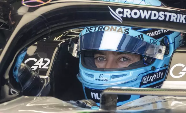 Mercedes driver George Russell, of Britain, sits in his car during the third practice session at the F1 Canadian Grand Prix auto race, Saturday, June 14, 2025, in Montreal. (Christinne Muschi/The Canadian Press via AP)