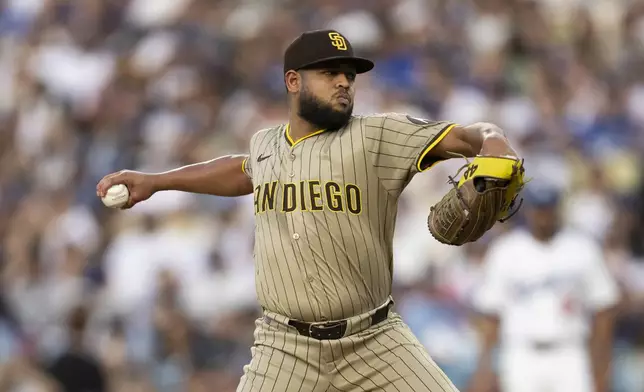 San Diego Padres starting pitcher Randy Vásquez delivers a pitch during the first inning of a baseball game against the Los Angeles Dodgers in Los Angeles, Tuesday, June 17, 2025. (AP Photo/Kyusung Gong)