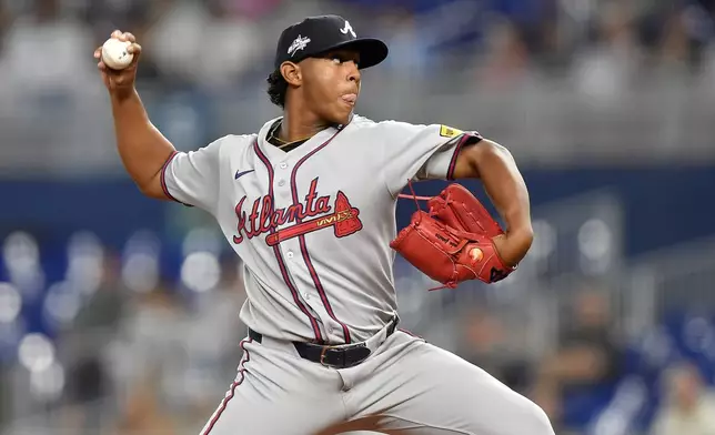 Atlanta Braves pitcher Didier Fuentes throws to a Miami Marlins batter during the first inning of a baseball game, Friday, June 20, 2025, in Miami. (AP Photo/Michael Laughlin)