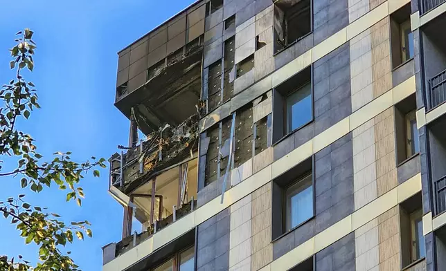 A view of the damaged flat of an apartment building where the Ukrainian drone fell in Krasnogorsk, just outside Moscow, Russia, on Tuesday, June 24, 2025. (Moscow News Agency via AP)