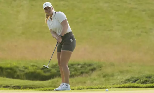 Maja Stark, of Sweden, putts on the 18th hole during the fourth round of the U.S. Women's Open golf tournament at Erin Hills Sunday, June 1, 2025, in Erin, Wis. (AP Photo/Matt York)