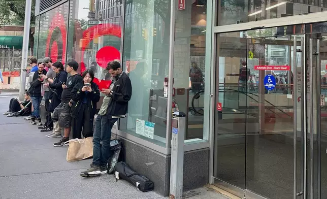 People line up outside a Target store for the new Nintendo Switch 2 video game consoles on Thursday, June 5, 2025 in New York. (AP Photo/Shawn Chen)