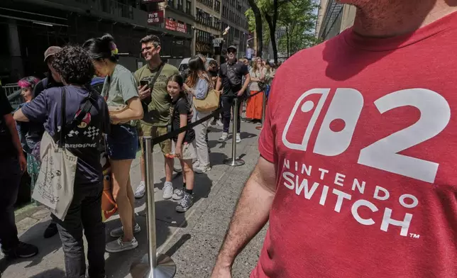 People wait in line outside the Nintendo store in New York's Rockefeller Center, Thursday, June 5, 2025. (AP Photo/Richard Drew)