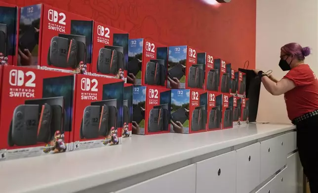 Nintendo Switch 2 devices are ready for sale at the Nintendo store in New York's Rockefeller Center, Thursday, June 5, 2025. (AP Photo/Richard Drew)