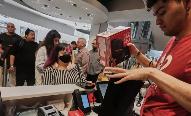 A Nintendo Switch 2 is sold at the Nintendo store in New York's Rockefeller Center, Thursday, June 5, 2025. (AP Photo/Richard Drew)