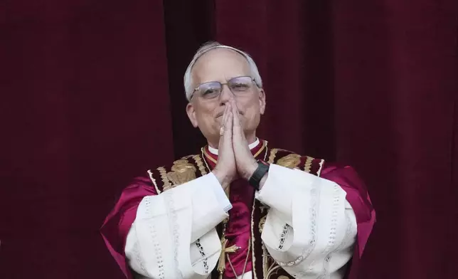 Newly elected Pope Leo XIV appears at the balcony of St. Peter's Basilica at the Vatican, May 8, 2025. (AP Photo/Alessandra Tarantino)