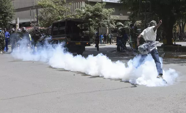 Demonstrators protest over the death in police custody of blogger Albert Ojwang, in Nairobi, Kenya, Thursday, June 12, 2025. (AP Photo/Andrew Kasuku)