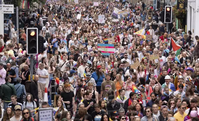 People take part in the Pride Edinburgh 2025 parade through Edinburgh city centre, Scotland, Saturday June 21, 2025. (Jane Barlow/PA via AP)